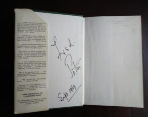 front paste-down and end paper in a 1959 copy of The Racing Driver by Denis Jenkinson, Signed by Fred Jiggs Peters