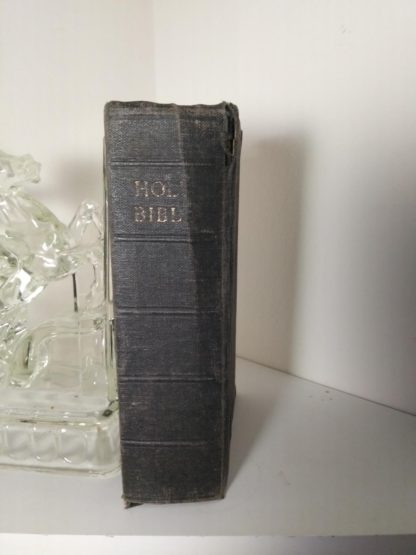 Spine view of a 200-year-old Bible, published in 1812 by the American Bible Society