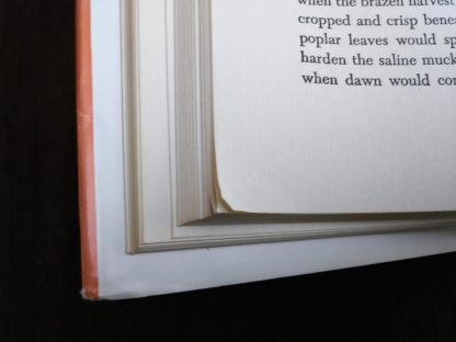 close up of bent pages in a copy of The Dog Who Wouldnt Be, 1957, 4th edition, by Farley Mowat