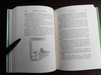 page 106 and 107 in a 1960 Golden Anniversary Edition of The Wind in the Willows by Kenneth Grahame