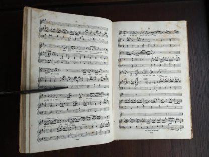 page 68 and 69 in a copy of Samson, an Oratorio in Vocal Score, composed in 1742, by Handel