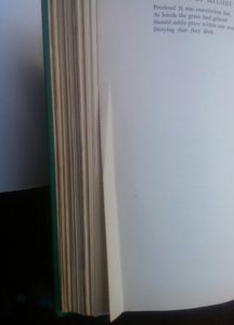 page with a bend in a 1945 First Edition of Bolts of Melody by Emily Dickinson