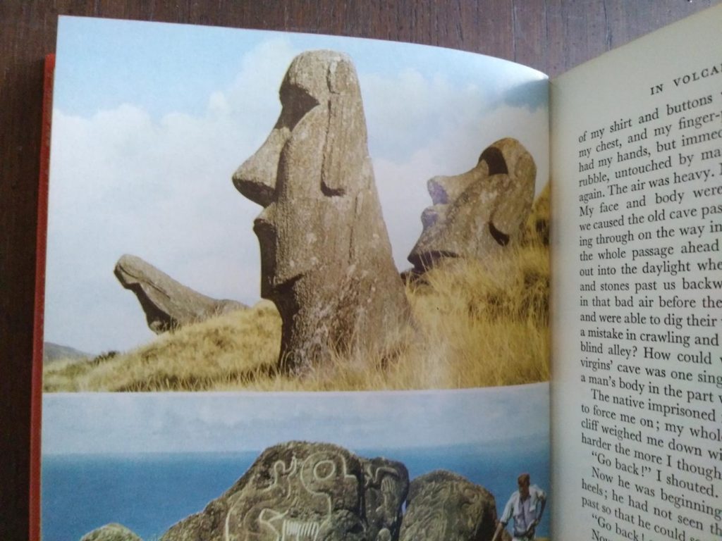 photographs of the Easter island statues in a 1958 First Edition of Aku-Aku, The Secret Of Easter Island