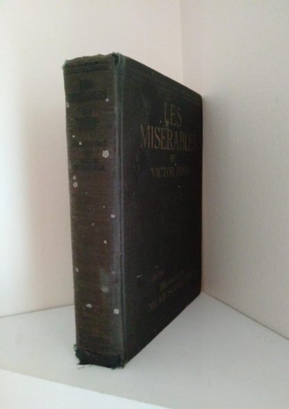 spine view of a copy of Les Miserables illustrated by Mead Schaeffer published by Dodd Mead and Company