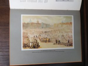 Color plate of Smithfield Market in 1810 in a 1942 first edition copy of Vintage of London by John Betjeman