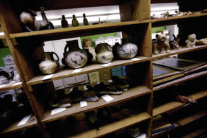 Shelves of artifacts at the Fogelson Library on the former campus of the Santa Fe University of Art and Design
