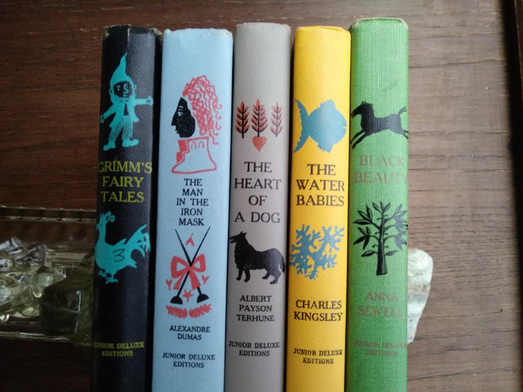 popular titles from childrens Junior Deluxe Editions Collection, Circa 40s -50s spine view up close