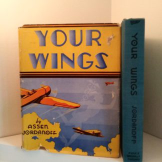 spine view of a 1939 copy of Your Wings by Assen Jordanoff