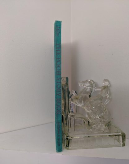 Spine view of a 1965 copy of The Pooh Story Book stated 1st Canadian Edition