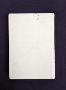 backside cloth coved binding of a 1950 copy of Now we Are Six by A. A. Milne. First Reissue Edition
