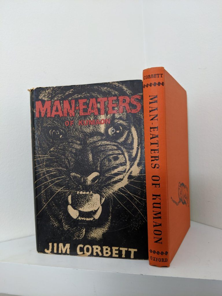 front dustjacket and spine view of a 1946 First American Edition of MAN-EATERS of Kumaon by Jim Corbett