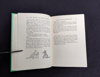 page 34 and 35 in a 1963 copy of The House at Pooh Corner by A. A. Milne