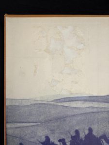 front pastedown damage up close in a 1927 copy of Revolt in the Desert by T. E. Lawrence