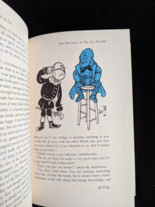 illustration by Denslow of the Discovery of Oz in a 1962 copy of The Wizard of Oz published by Macmillan Company