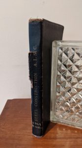 1941 copy of Steel Construction published by American Institute Of Steel Construction- third edition - fourth printing - spine view