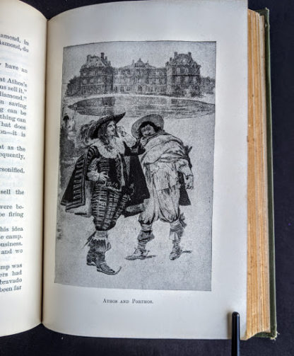 illustration of Athos and Porthos inside a 1900 copy of The Three Musketeers by Alexandre Dumas - Published by Caldwell Company Publishers