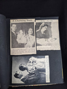 picture of Queen Elizabeth being held as a baby by her parents