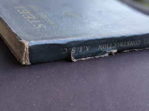 tear in spine on a 1941 copy of Steel Construction published by American Institute Of Steel Construction- third edition - fourth printing