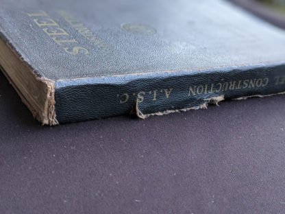 tear in spine on a 1941 copy of Steel Construction published by American Institute Of Steel Construction- third edition - fourth printing