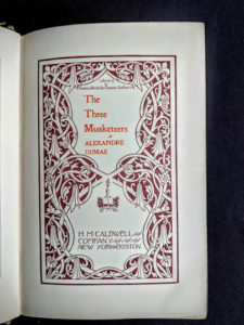 title page up close inside a 1900 copy of The Three Musketeers by Alexandre Dumas - Published by Caldwell Company Publishers