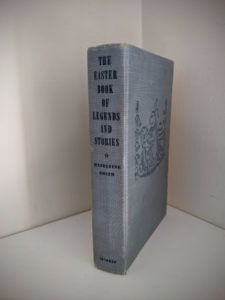 Spine view of a 1952 copy of The Easter Book Of Legends And Stories - fourth Edition -illustrated by Pamela Bianco