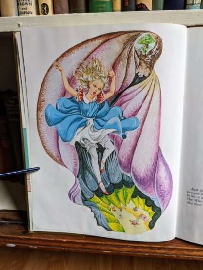 1985 Alice in Wonderland - Ottenheimer Publishers - Printed in Italy - illustration falling down rabbit hole