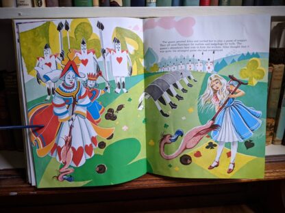 illustration of Alice playing croquet with the Queen -1985 Alice in Wonderland - Ottenheimer Publishers - Printed in Italy