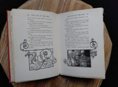 Page 86 and 87 inside a 1904 copy of The Day of the Dog by George Barr McCutcheon - First Edition