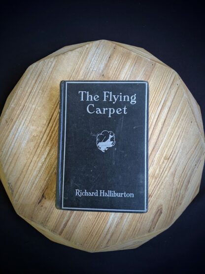 Front panel on a 1932 copy of The Flying Carpet by Richard Halliburton - First Edition