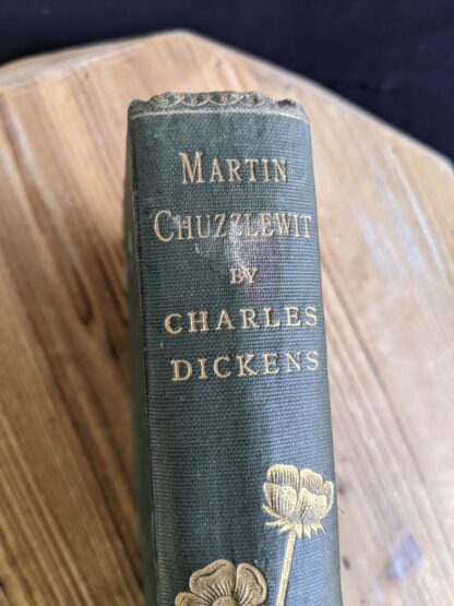 Spine View up close on an antiquarian copy of The Life and Adventures of Martin Chuzzlewit by Charles Dickens - Circa 1880's - undated