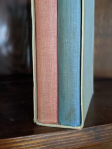 foot of spine view - upper spine view - 1946 Alice’s Adventures in Wonderland and Through The Looking-Glass - Two Volumes - by Lewis Carroll. Published by Random House, New York - Special Edition