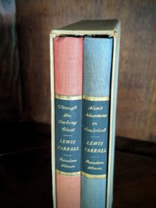 upper spine view - 1946 Alice’s Adventures in Wonderland and Through The Looking-Glass - Two Volumes - by Lewis Carroll. Published by Random House, New York - Special Edition