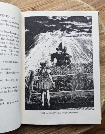Full page illustration of Dorothy meeting the Scarecrow - 1944 The New Wizard of Oz by L. Frank Baum - Illustrations by Evelyn Copelman