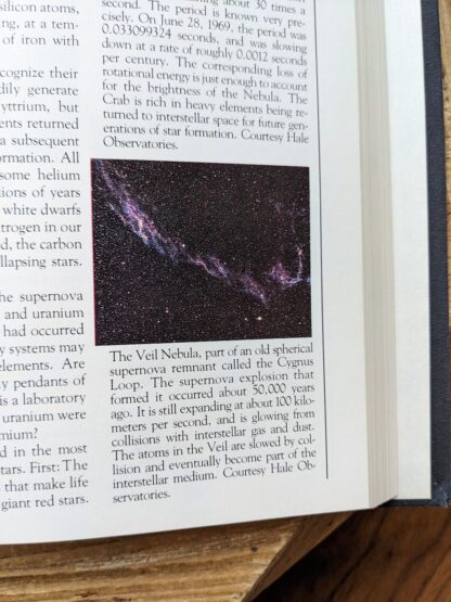 image up close inside a 1980 copy of Cosmos by Carl Sagan