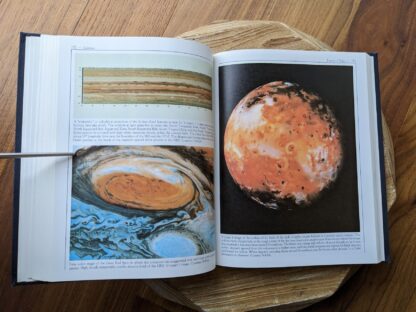 images inside a 1980 copy of Cosmos by Carl Sagan