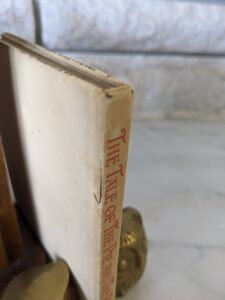 rip to upper binding - 1925 The Tale of The Pie and The Patty Pan by Beatrix Potter