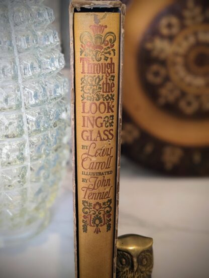 Upper spine view in slipcase- 1941 Through the Looking Glass by Lewis Carroll - The Heritage Press - illustrated by John Tenniel