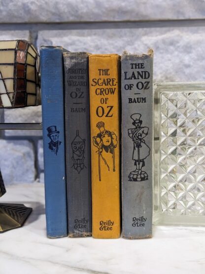 Lot of 4 Antiquarian Wizard of Oz Books - Spine view