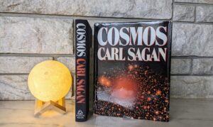 1980 Cosmos by Carl Sagan - First Edition with DJ