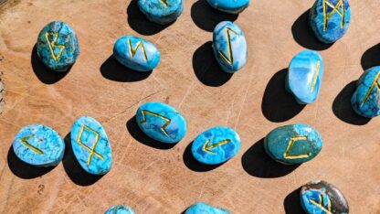 Rune set up close engraved on Natural Blue Morenci Turquoise