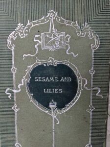 front panel up close - 1897 Sesame and Lilies; Three Lectures by John Ruskin - W.J. Gage & Company, Toronto