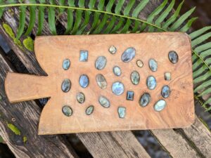Reverse side view - Rune Set hand carved on 520 Ct Polished Rainbow Labradorite - Ash Tree Runes