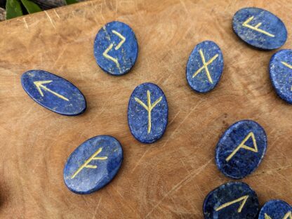 Rune set hand carved on 600 Ct Natural Blue Lapis with Gold Pyrite Spots - up close