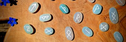 Hand Carved Rune set on 465 Ct of Natural Heat Treated polished Blue Onyx - up close