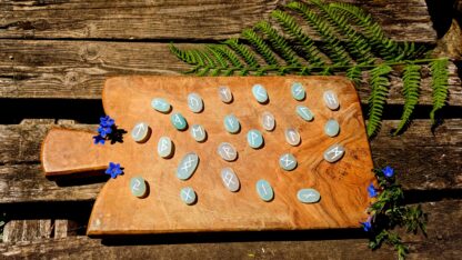 Hand Carved Rune set on 465 Ct of Natural polished Blue Onyx