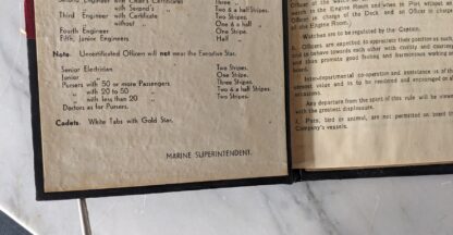 bottom of front pastedown up close - Rare India Steamship Company Service Regulations Book – Bolted Leather Binding - c.1930s
