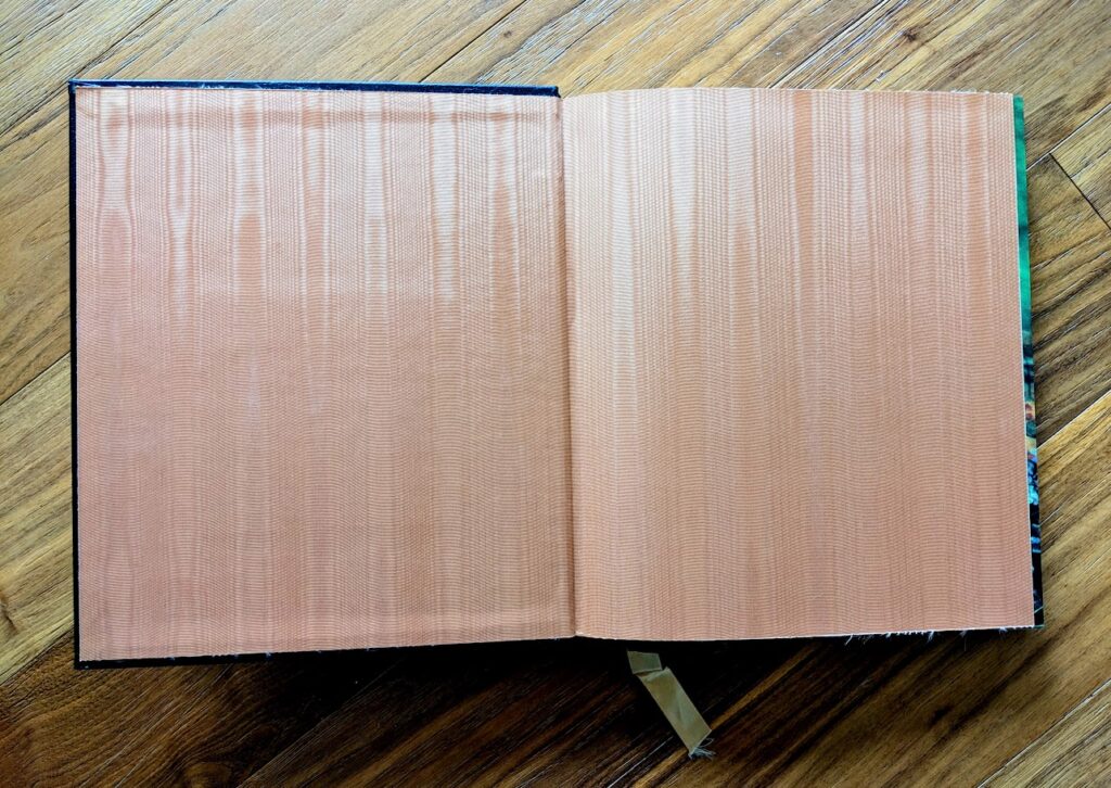 moiré silk endpapers - First Edition of Horses of the Sun A Gallery of the World's Most Exquisite Equines by Robert Vavra