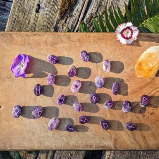Hand carved Elder Futhark Rune set on 290 Ct of African Amethyst flat side up with runes showing