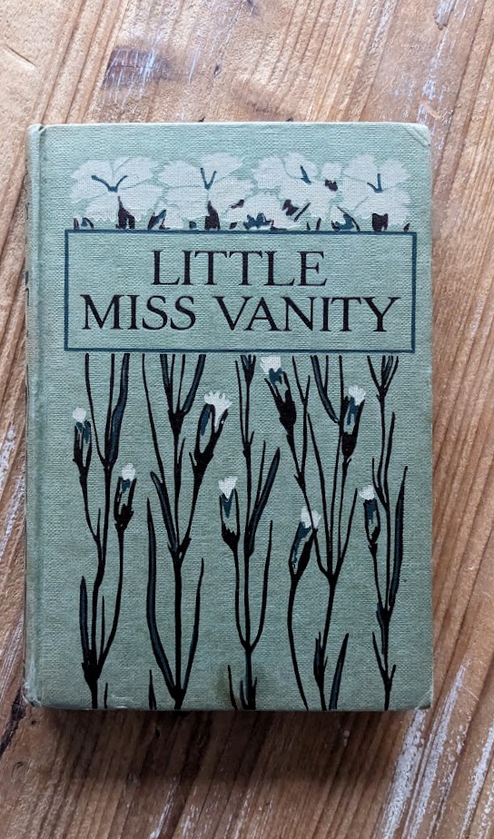 Little Miss Vanity by Mrs. Henry Clarke – Undated – Rare Copy - Blackie and Son Limited - front panel up close