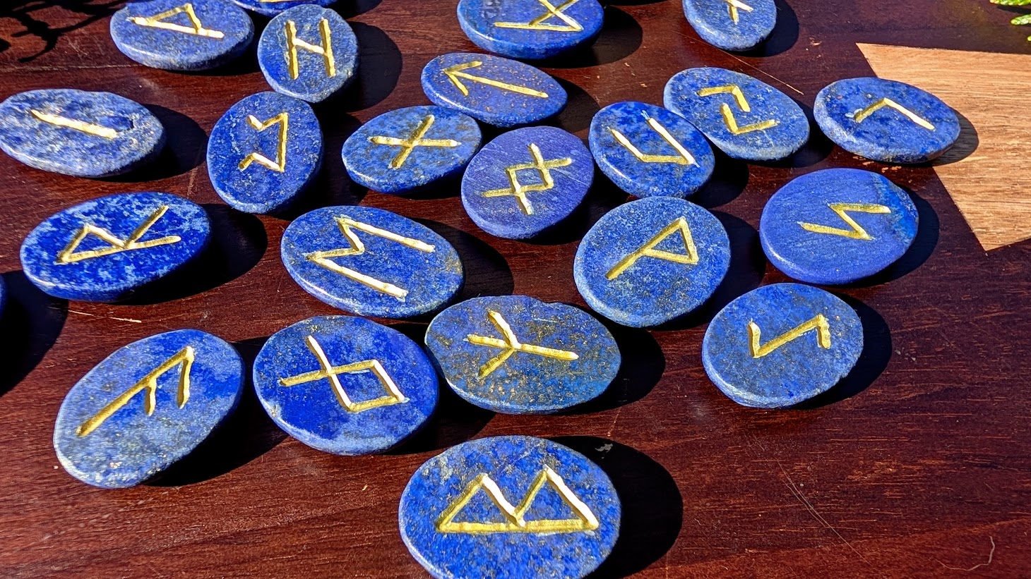 Hand Carved Elder Futhark Rune Set - 970 Ct of Lapis Lazuli - up close